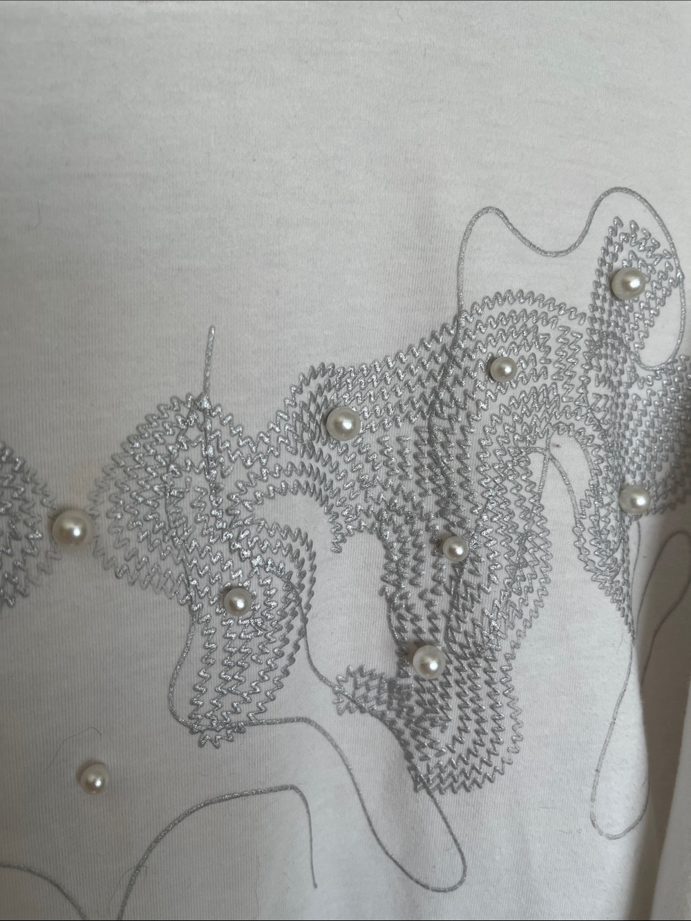Rebecca Malone White Tee with pearl embellishment’s around neckline